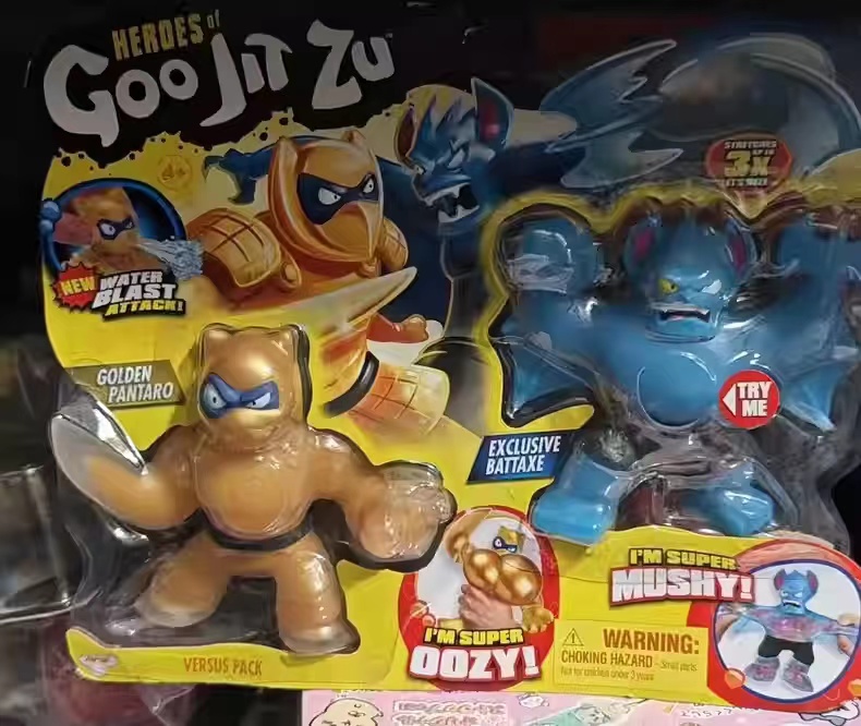 Heroes Of Goo Jit Zu Versus Pack - Pantaro Dorato Con Attacco Acqua Vs Battaxe Super Morbido - Figure Action Gooey Elastiche Per Bambini