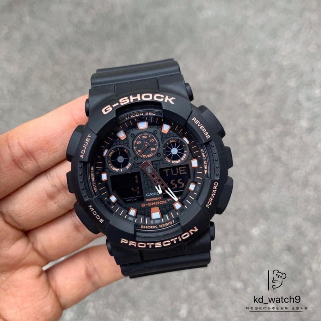 G shock ga 100 black online gold