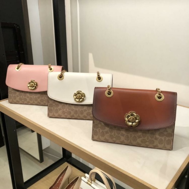 Coach parker in signature canvas with tea rose 2024 turnlock