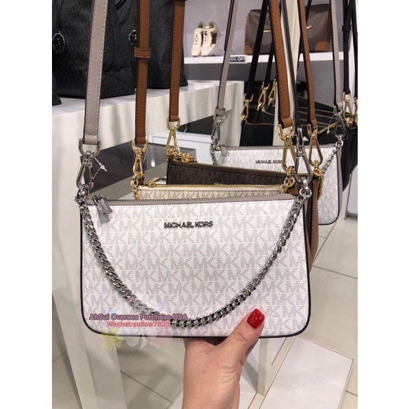 Michael Kors Jet Set Travel Medium Zip Pouchette with Signature Canvas,  Women's Fashion, Bags & Wallets on Carousell