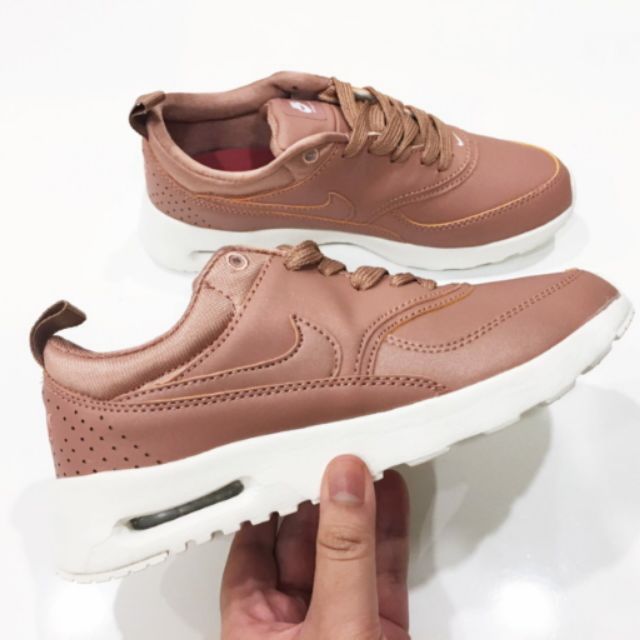 Nike thea clearance rose