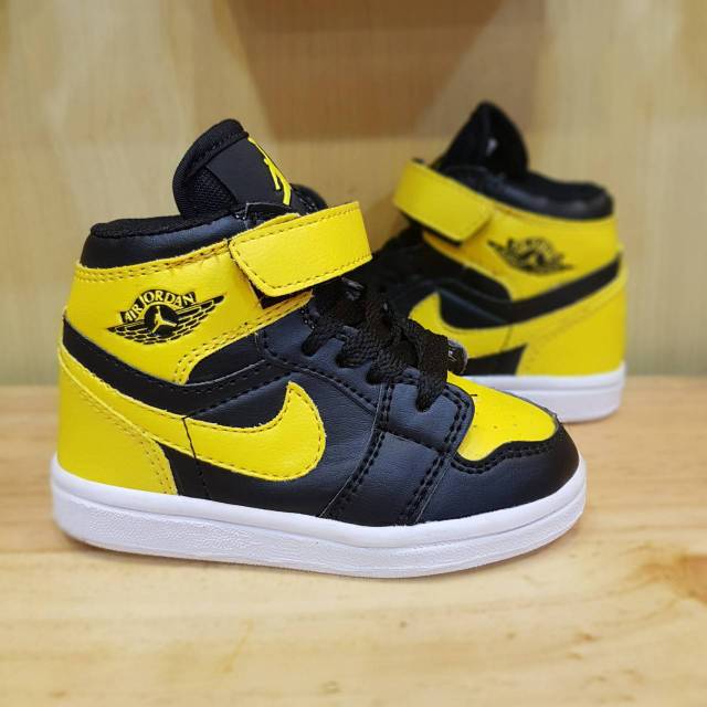 Black and yellow outlet jordans for kids