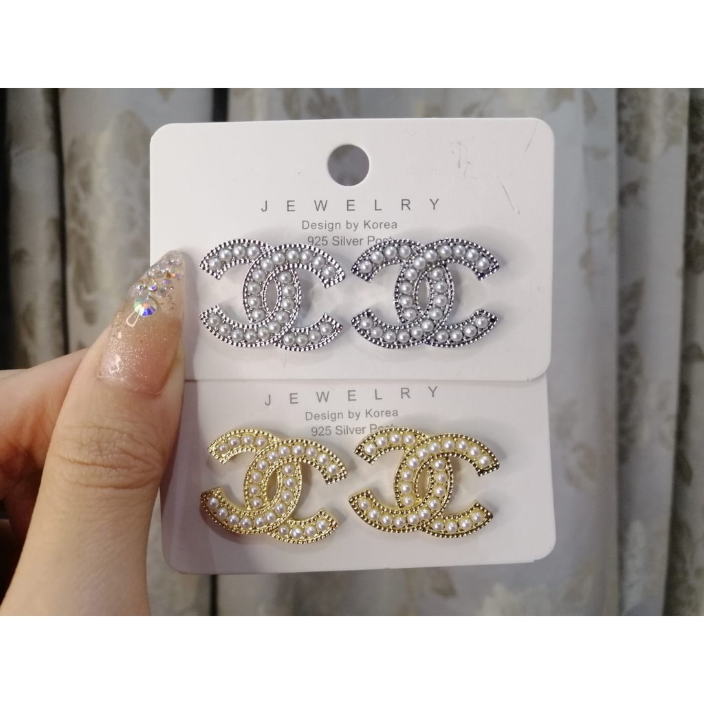 Fake hot sale cc earrings