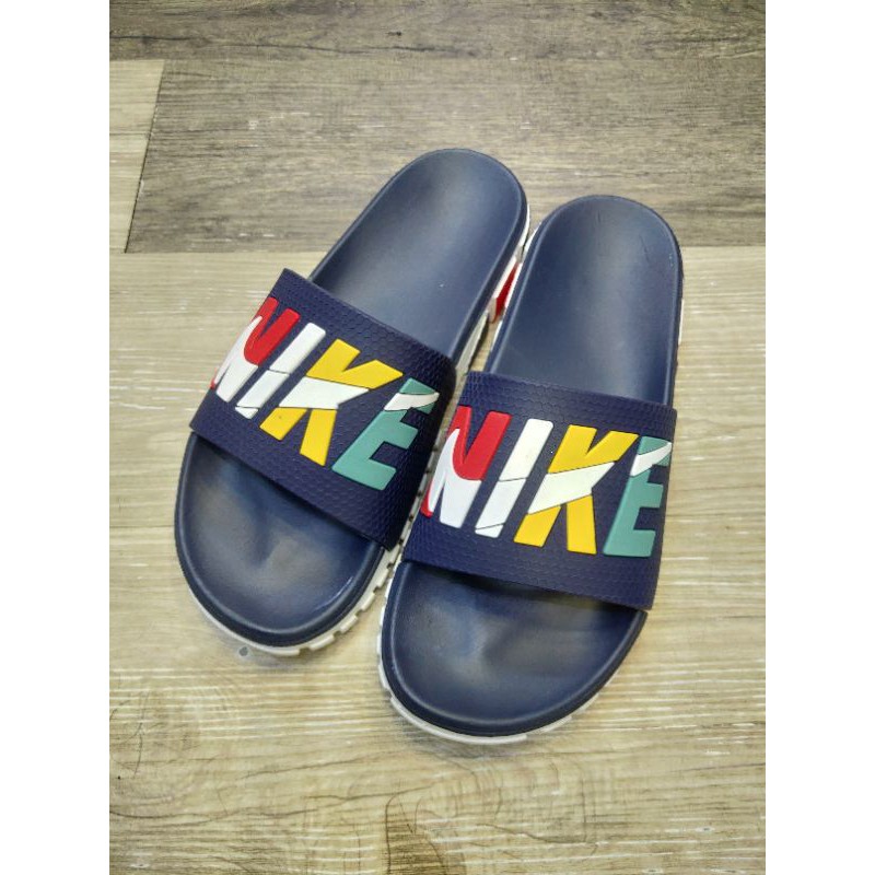 selipar nike original