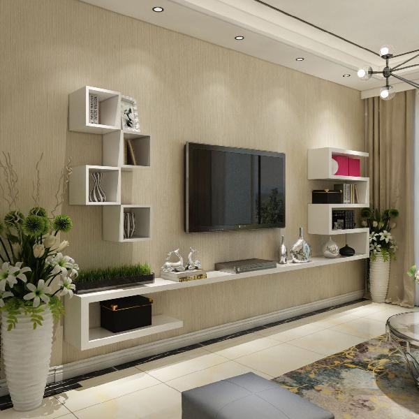 shelves, pictures, art and other things mounted on a wall around a tv