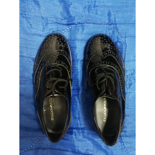 Kasut brogue store