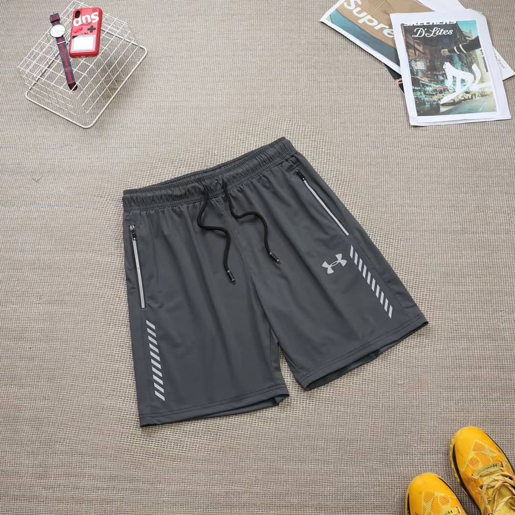 Under armour shorts with zipper outlet pockets