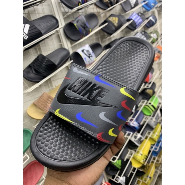 Nike slides shop with changeable swoosh