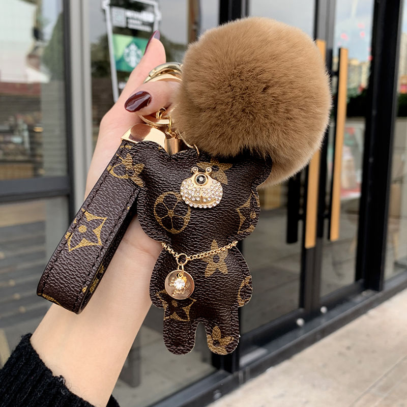 Lv pom pom keychain deals