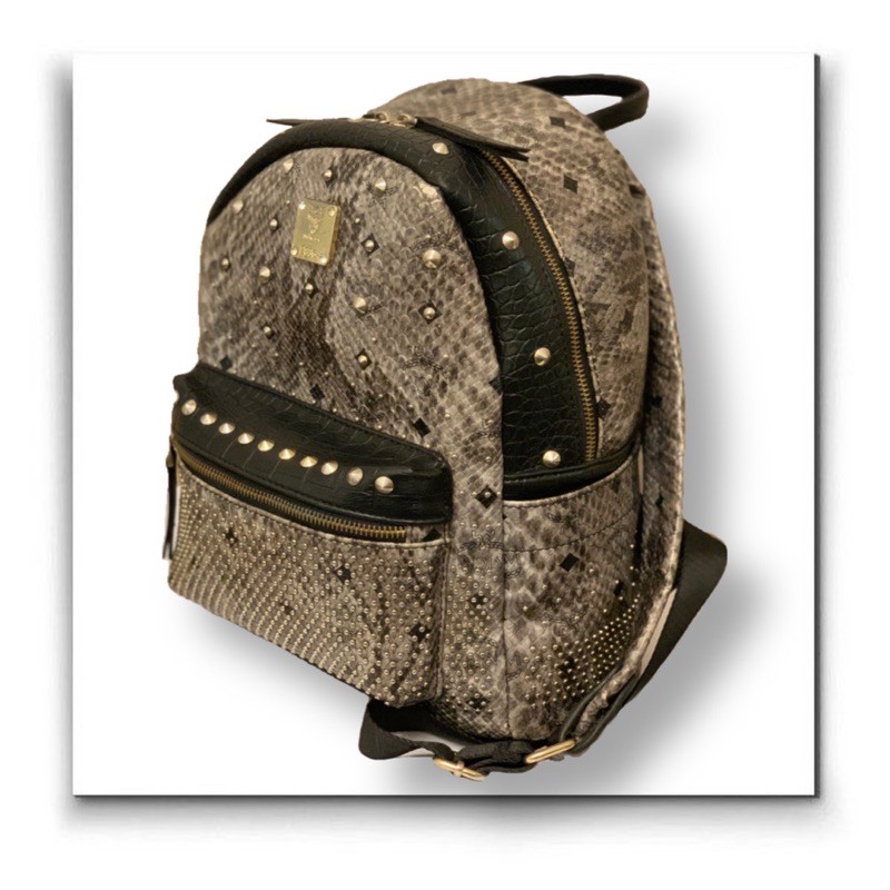 Mcm backpack snakeskin best sale