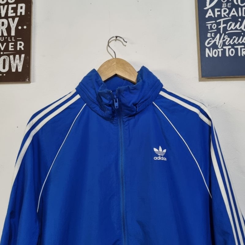 Adidas sst windbreaker blue online