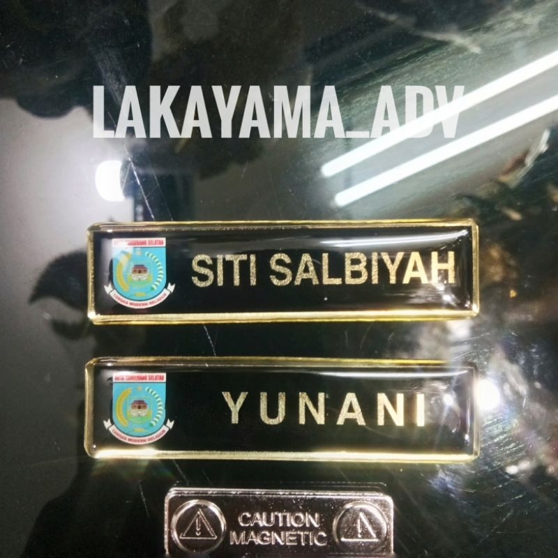 Name tag made of quality resin coated brass with magnetic finish ...