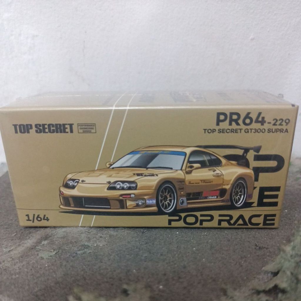 PR640277 1/64 Top Secret GT300 Supra Carbon - Oro cromato POP