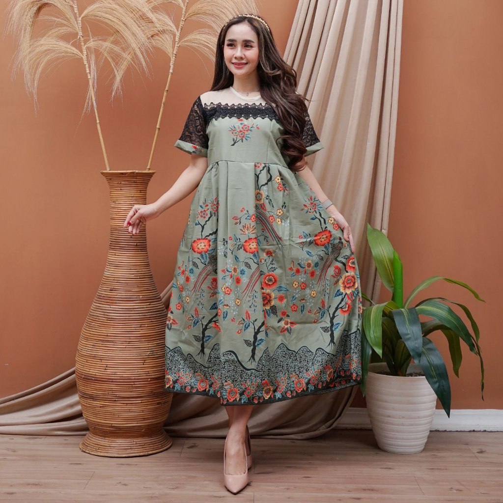 sachin and babi light blue dress Elegant Woman in Batik Dress at Café Batavia · Free Stock Photo main image 1