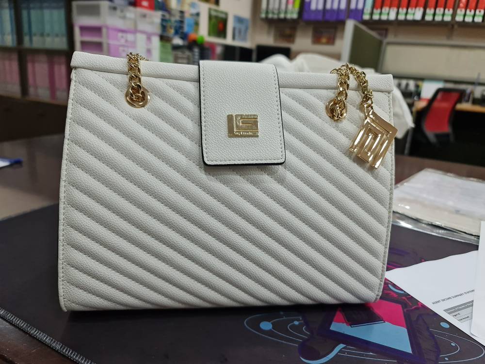 Leather handbag Guy Laroche White in Leather - 28349986