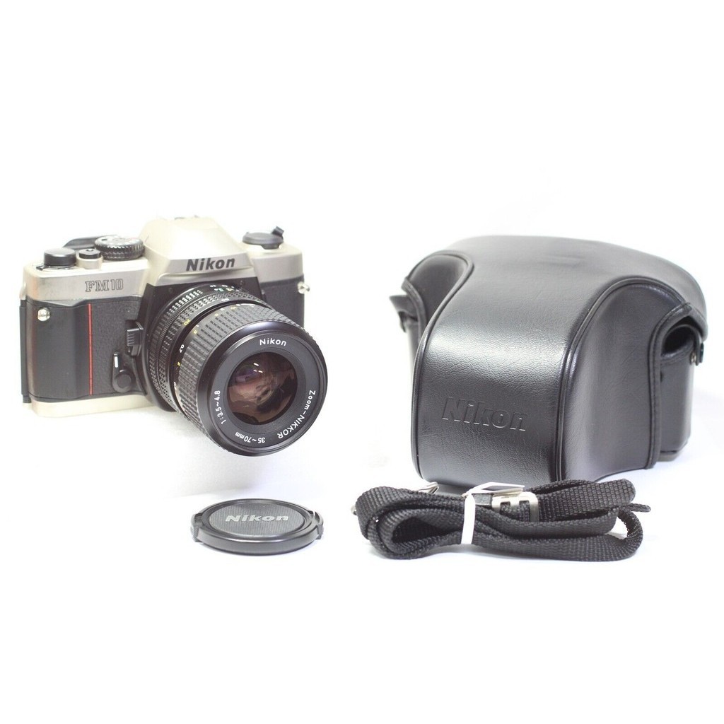 Appareil Photo Reflex Argentique Nikon FM10 + Objectif 35-70mm - Pour Pièces/ne Marche Pas