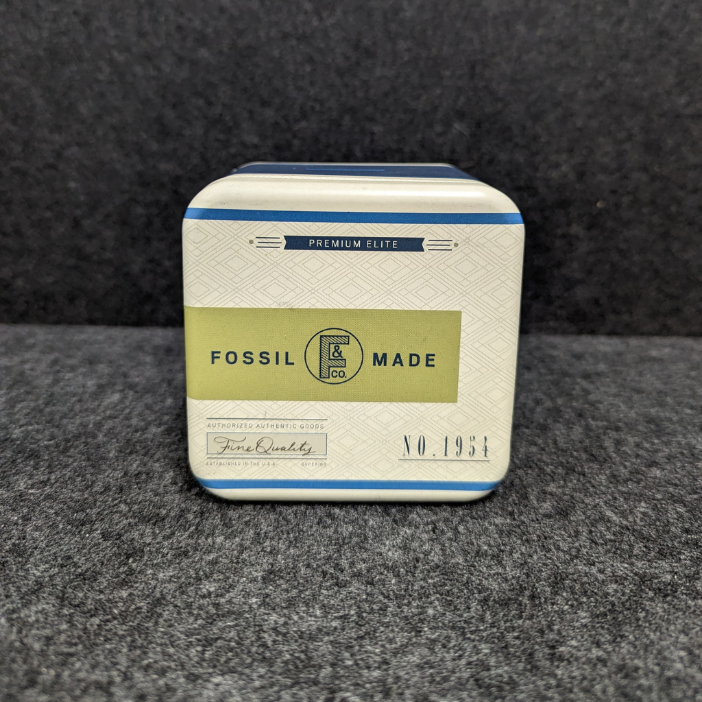 Fossil tin outlet box