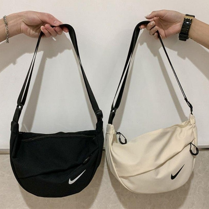 Nike sling bag store women