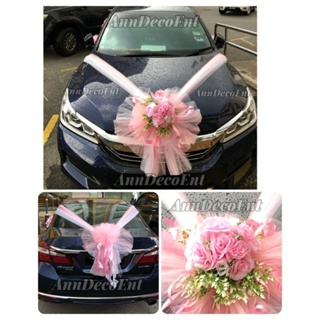 Wedding car decoration of flowers with roses and butterflies Stock