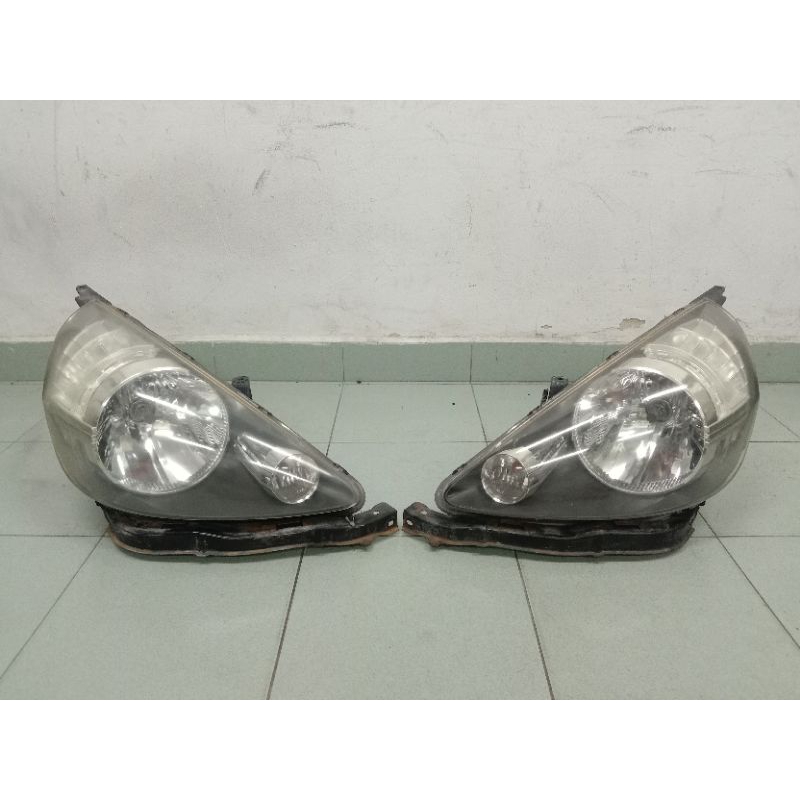 Faro anteriore alogeno per Honda Jazz GD 05-08 Set di lampadine L R