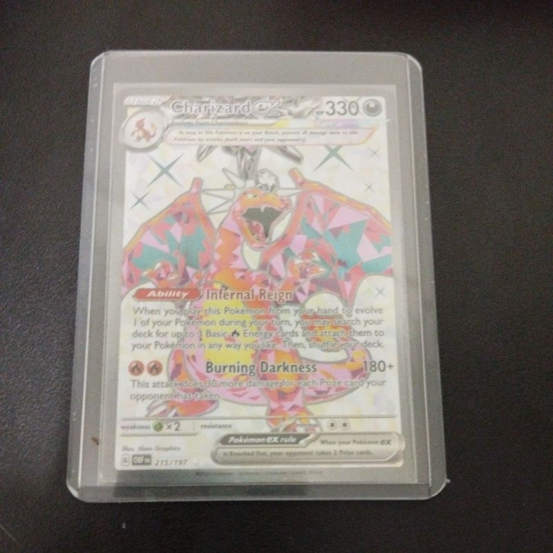 who has the rarest pokemon card Charizard ex (215/197) (OBF) – Poke Gems MTL main image 1