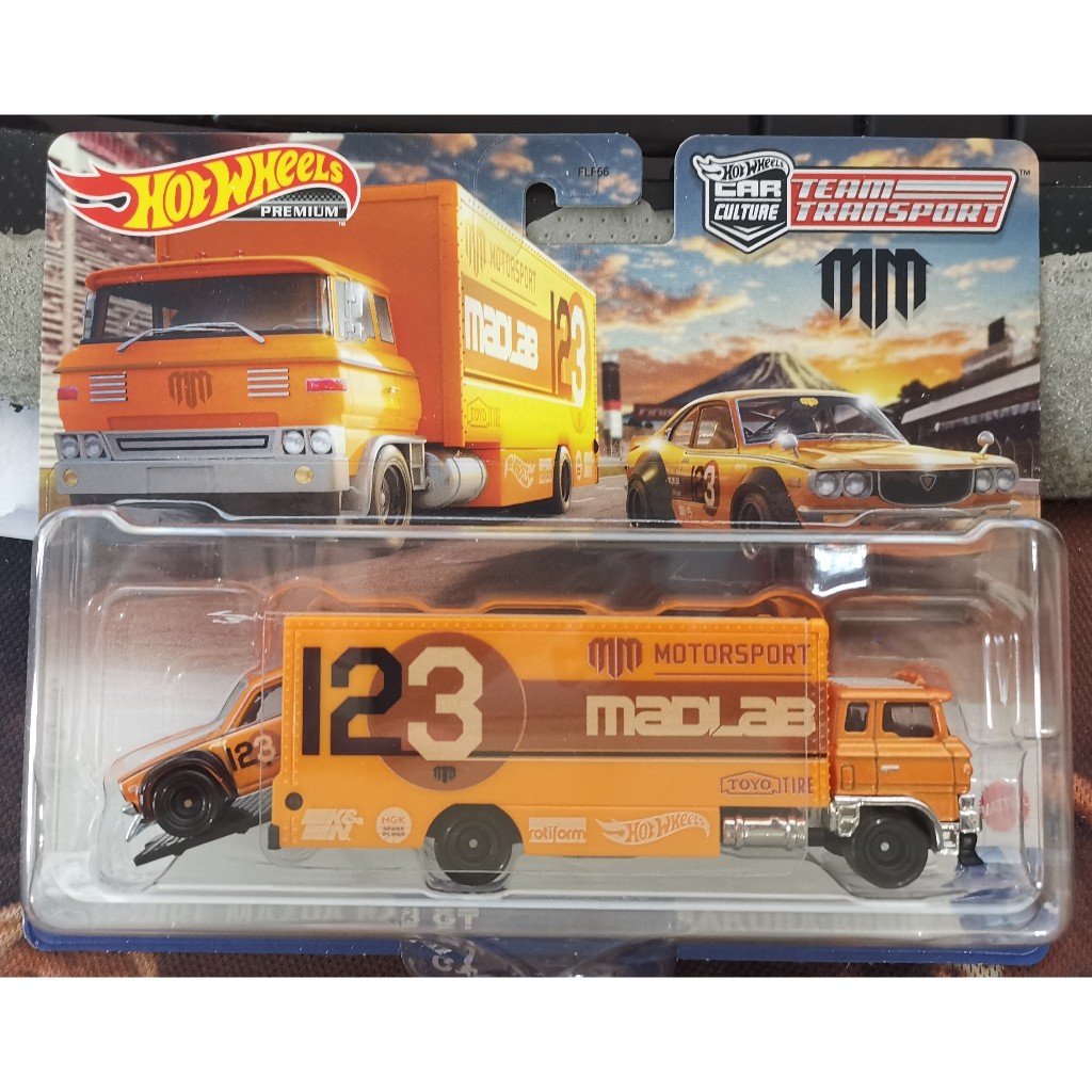 HOT WHEELS 2023 Team Transport Mad Mike Mazda Rx3 Gt & Sakura Sprinter