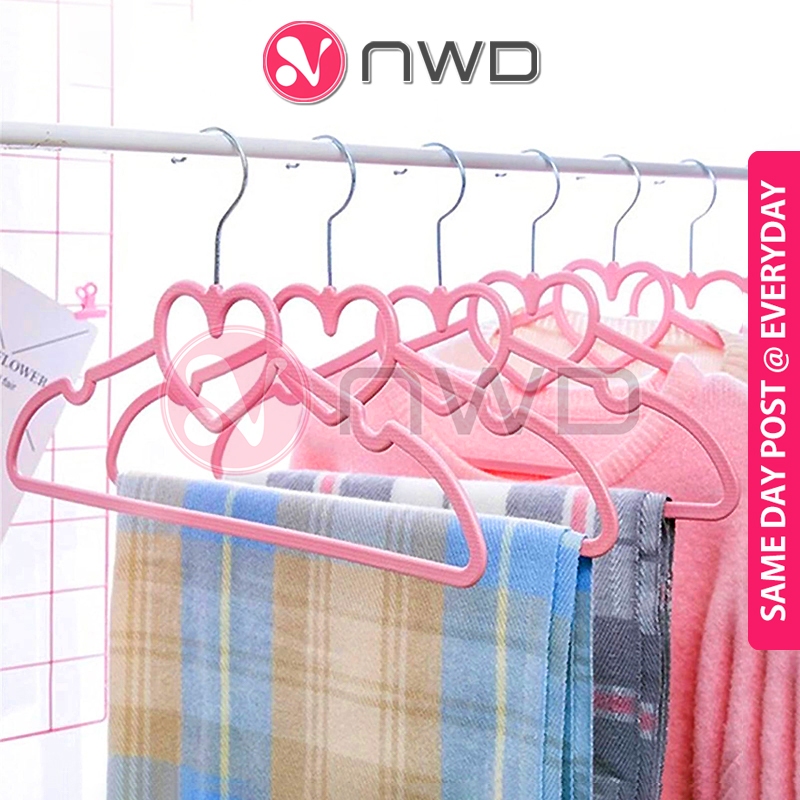𝗔𝗡𝗧𝗜 𝗦𝗟𝗜𝗣 》 Multifunctional Plastic Hanger Pink Love Ribbon Shape Cute ...