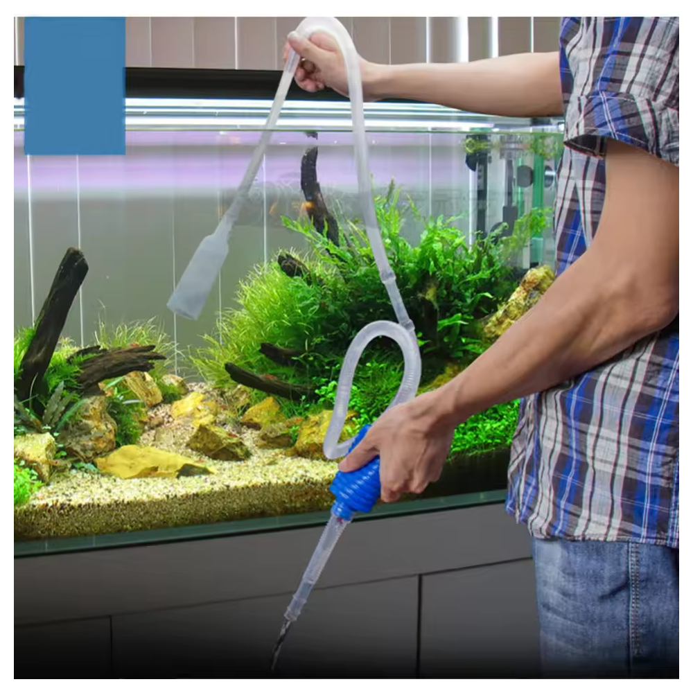 Aquarium gravel vacuum being used during a water change