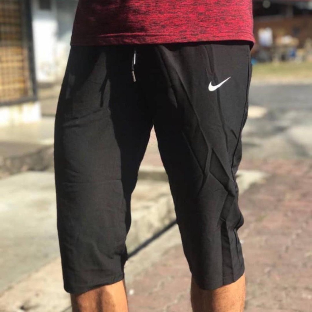 Nike three quarter shorts on sale