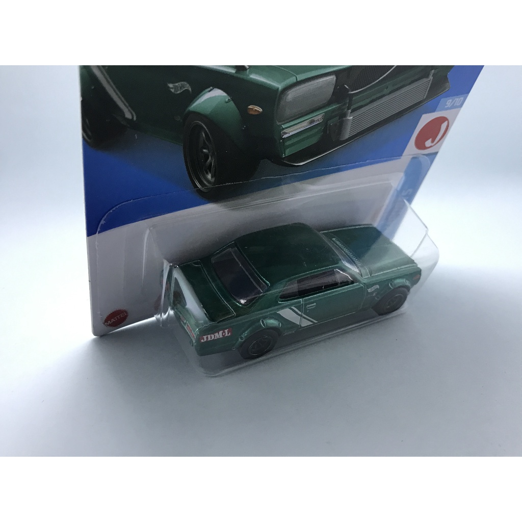 Hot Wheels Nissan Skyline HT 2000GT-X 187/250 J-Imports 2022 Super Treasure Hunt con protector de tarjeta