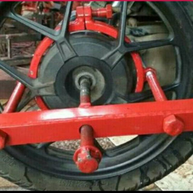 Universal automatic wheel tracker tire removal tool for universal ...