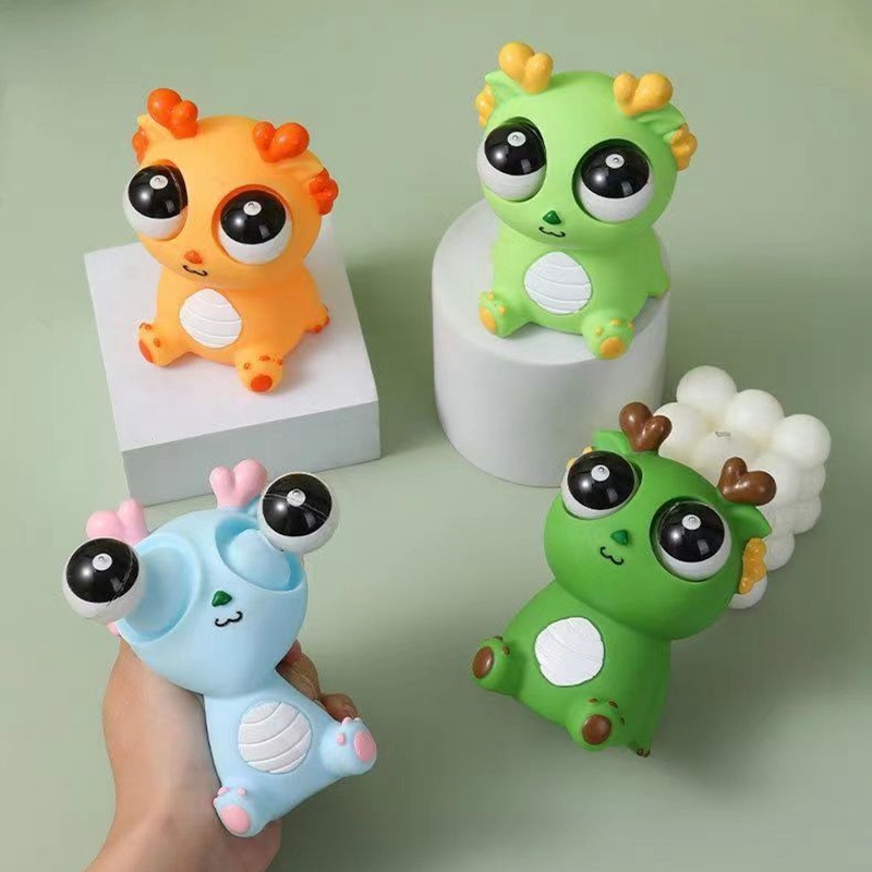 Squeezing Eyes Creative Toys Dinosaur Dragon Year Pinching Music Funny ...