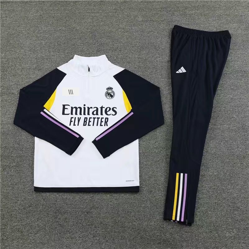 Real madrid half on sale zip