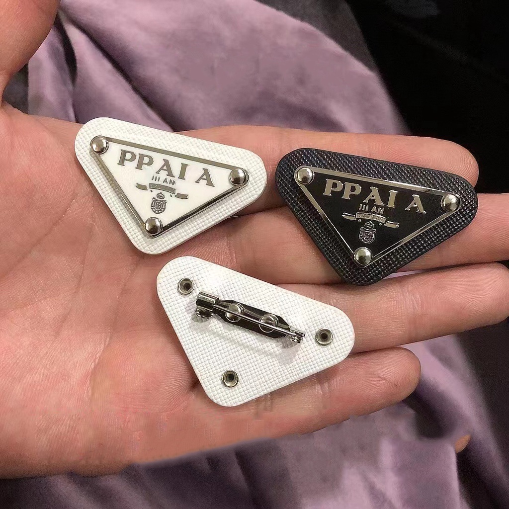 Trendy brand inverted triangle metal pu leather triangle logo brooch ...