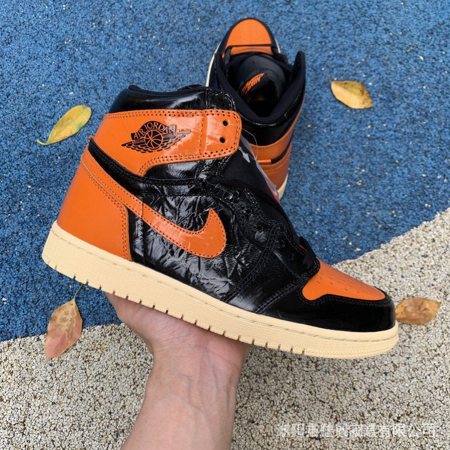 orange and black aj1