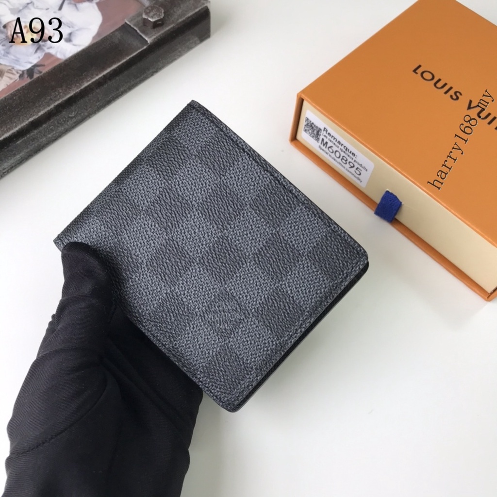 Louis Vuitton Men Multiple Wallet in embossed Damier Infini leather.