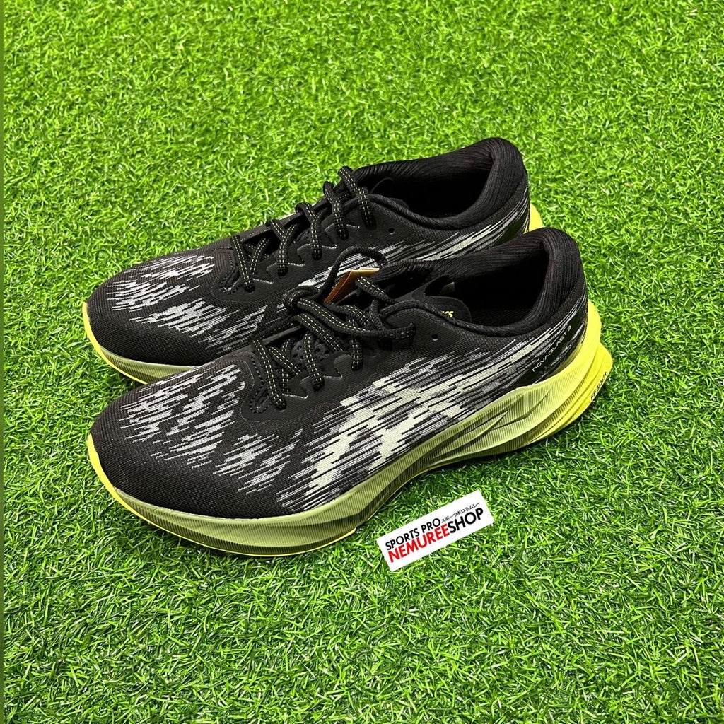 black and green asics running shoes