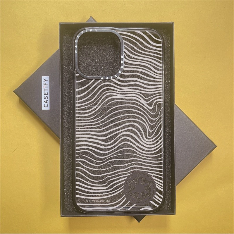 CASETiFY X The Mandalorian Beskar Ingot Black Edge Clear Sideband Font