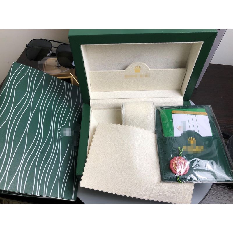 Rolex watch box and store matching gift bag