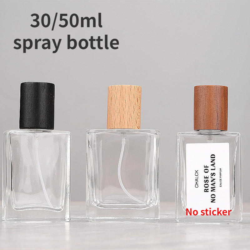 30ml 50ml Clear Glass Perfume Spray Bottle Empty Portable Premium  Refillable Bottle With Wooden Cap