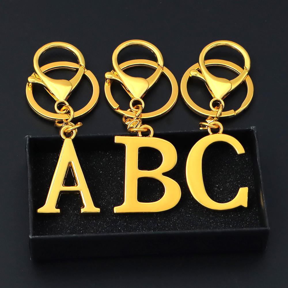 Simple Golden Color A-Z Letter Key Chains Solid Color Metal Key Ring ...