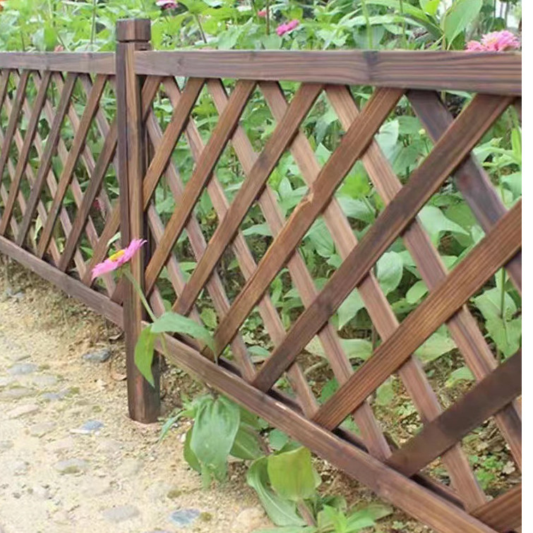 Garden timber doors Carbonised and preservative-treated timber fencing ...