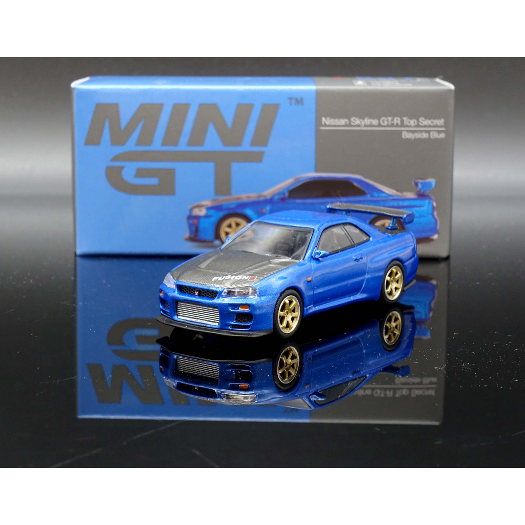 TSM 1:64 MINI GT Nissan Skyline GT-R (R34) V-Spec II Bayside Blue