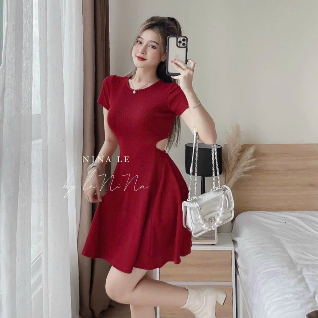 Dress with elasticated hem