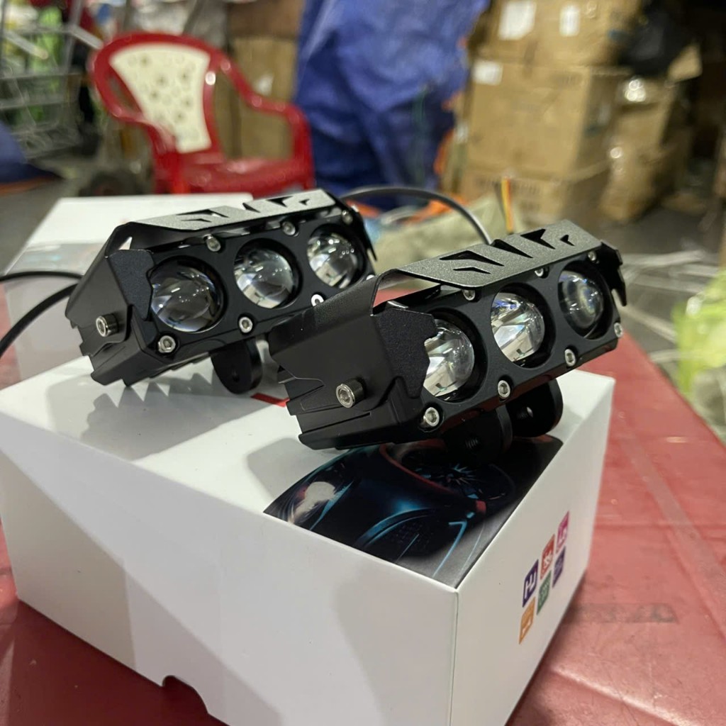 3-eye LED ball light for motorbikes and cars with white and yellow core ...
