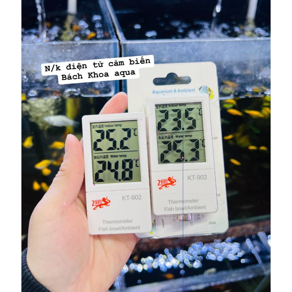 Kt-902 electronic thermometer applied to the outside of the tank to ...