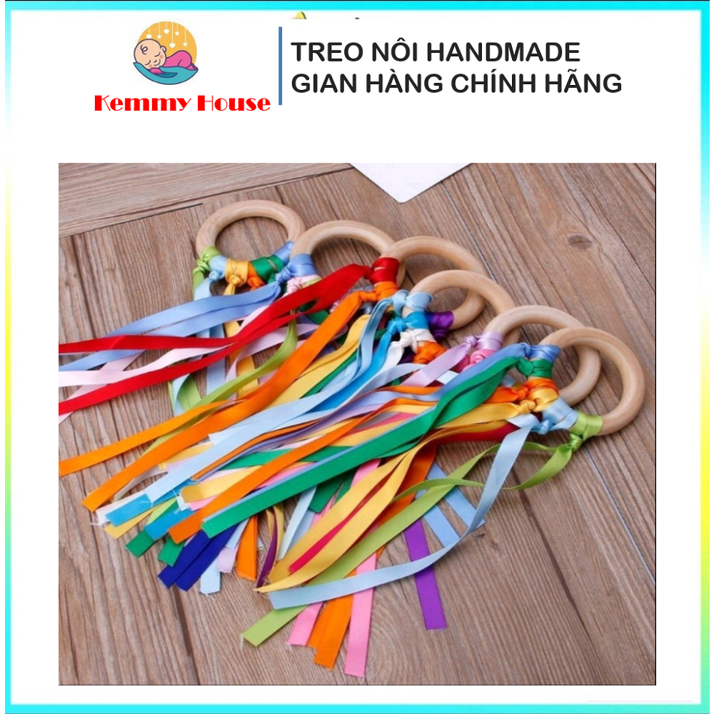 Montessori wooden rings with colorful ribbons help children practice ...