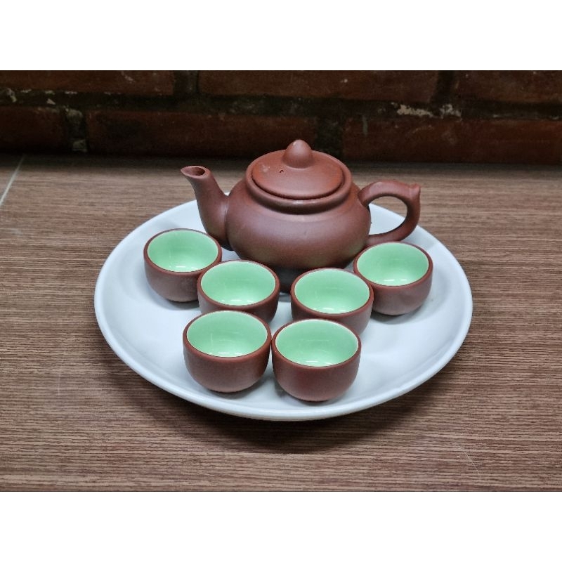 SA Zisha tea set includes 01 320ml pot, 6 cups and 1 23cm round ceramic ...
