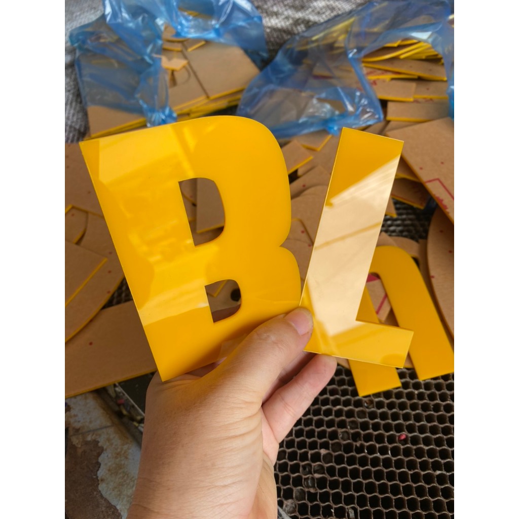 Saffron gold mica letters and numbers, advertising signs, walls, with ...