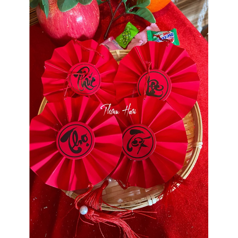Red round fan with hanging string and turua, 2 colors red and yellow ...